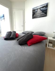 Ένα ή περισσότερα κρεβάτια σε δωμάτιο στο Escapade face à la mer