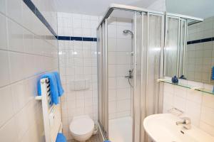 Koupelna v ubytování Gästehaus Gelsenkirchen + 8 fotografií