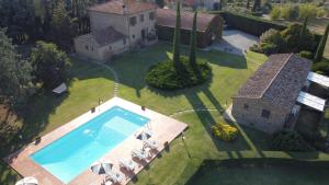 The swimming pool at or close to Fattoria Borgonuovo