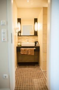 Ванна кімната в Landhotel zum grünen Kranze