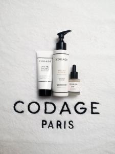 a group of three products sitting next to the word college parks at L'Agapa Hôtel - Spa Codage in Perros-Guirec