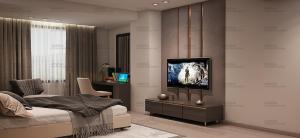 A television and/or entertainment centre at HOTEL NAT GRAND REGENCY LUDHIANA Punjab INDIA