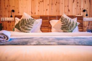 Aaryam Resort, Auliにあるベッド