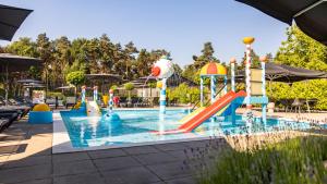 a swimming pool with a slide and a water park at Vakantiepark Molenvelden in Veldhoven