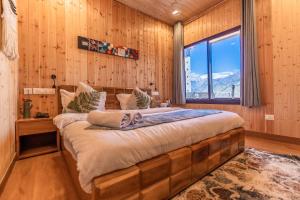Aaryam Resort, Auliにあるベッド