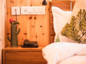 Aaryam Resort, Auliにあるベッド