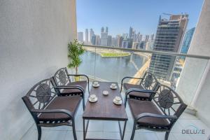 Balkón nebo terasa v ubytování Poised Studio at DAMAC Prive Business Bay by Deluxe Holiday Homes