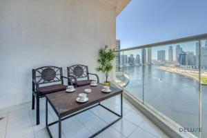 Balkón nebo terasa v ubytování Poised Studio at DAMAC Prive Business Bay by Deluxe Holiday Homes