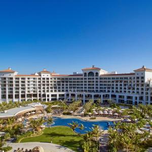 a large hotel with a pool and a resort at Waldorf Astoria Dubai Palm Jumeirah in Dubai