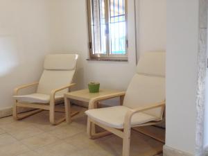 Area tempat duduk di La Giara - holiday apartments