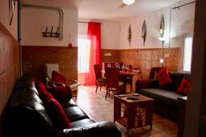 a living room with a couch and a table at Apartment with pool, hot tub and stunning views in Oria in Oria