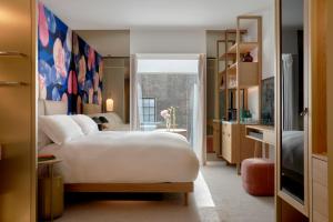The BoTree - Preferred Hotels and Resorts客房内的一张或多张床位