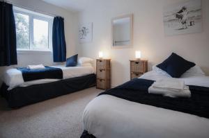 Ένα ή περισσότερα κρεβάτια σε δωμάτιο στο Sea Breeze Apt 2 - 2 Bedroom - Horton Beach