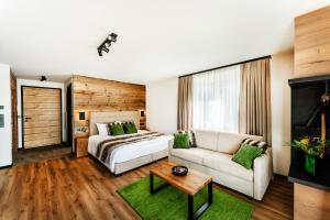 Ένα ή περισσότερα κρεβάτια σε δωμάτιο στο Black Forest Luxury Apartment Bärenhöhle mit Sauna +36 φωτογραφίες