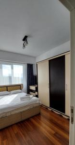 Cama o camas de una habitación en Elite Apartment in Bishkek Park Residence