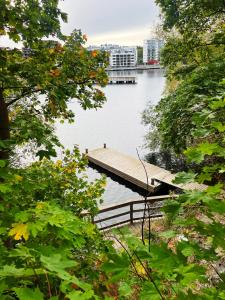 a dock in the middle of a body of water at Apartment with amazing view in Stockholm