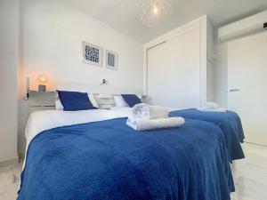 Łóżko lub łóżka w pokoju w obiekcie Hacienda Casares MAGNOLIA 2430