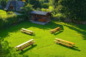 A garden outside Jugendgästehaus St. Gilgen