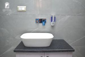 Koupelna v ubytování Qotel Hotel Signature BNB-Ashok Vihar