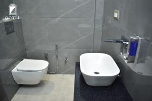 Koupelna v ubytování Qotel Hotel Signature BNB-Ashok Vihar