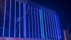 a blue building with a street sign on it at Stay Suite Hotel in Istanbul