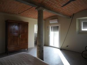 Postel nebo postele na pokoji v ubytování A chalet in the Italian countryside