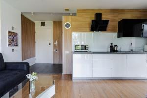 Kuchyňa alebo kuchynka v ubytovaní Harenda Residence - Destigo Hotels