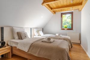 Posteľ alebo postele v izbe v ubytovaní Harenda Residence - Destigo Hotels