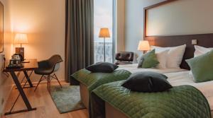 Postel nebo postele na pokoji v ubytování Clarion Hotel Helsinki + 37 fotografií