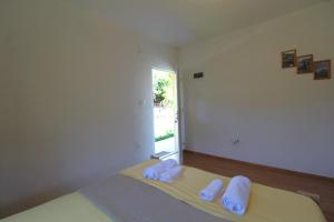 Voodi või voodid majutusasutuse Apartments Stevan toas
