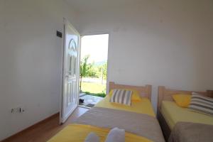 Voodi või voodid majutusasutuse Apartments Stevan toas
