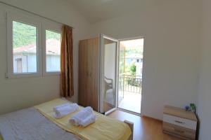 Voodi või voodid majutusasutuse Apartments Stevan toas