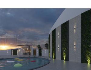 ドバイにあるMD Hotel By Gewanのスイミングプール付きの建物の景色を望めます。