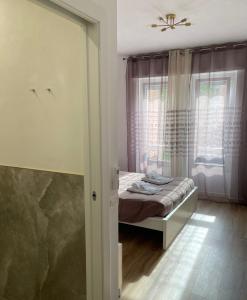 Letto o letti in una camera di Da Nord a Sud - Affittacamere