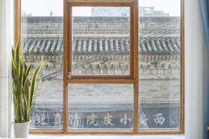 长安·忆设计师民宿(西安钟鼓楼回民街店) 陽台或露臺