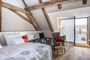 Voodi või voodid majutusasutuse Yard Resort toas