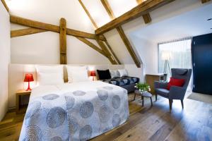 Voodi või voodid majutusasutuse Yard Resort toas