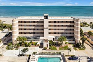an aerial view of a hotel with the beach at Direct Oceanfront Condo Amazing Views Cocoa Beach in Cocoa Beach