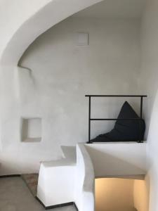 Łóżko lub łóżka w pokoju w obiekcie Casa Vacanze Arma delle Manie