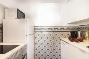 Kuchyň nebo kuchyňský kout v ubytování Aspasios Charming Flats