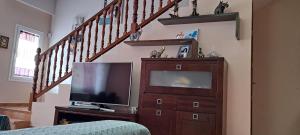 TV a/nebo společenská místnost v ubytování Casa LuaSol