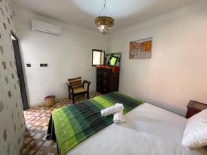 Voodi või voodid majutusasutuse Sun Hostel toas