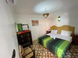 Voodi või voodid majutusasutuse Sun Hostel toas