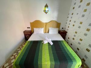 Voodi või voodid majutusasutuse Sun Hostel toas