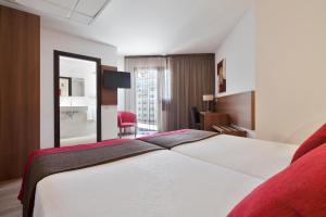 Postel nebo postele na pokoji v ubytování Hotel Best Auto Hogar