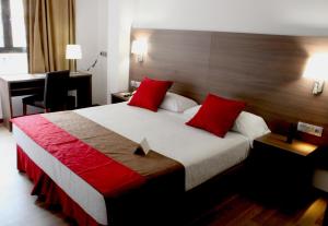 Postel nebo postele na pokoji v ubytování Hotel Best Auto Hogar