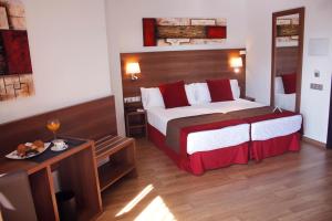 Postel nebo postele na pokoji v ubytování Hotel Best Auto Hogar