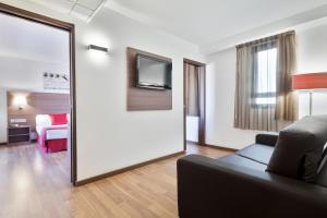 TV a/nebo společenská místnost v ubytování Hotel Best Auto Hogar