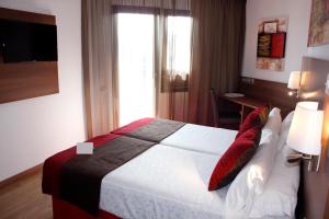 Postel nebo postele na pokoji v ubytování Hotel Best Auto Hogar
