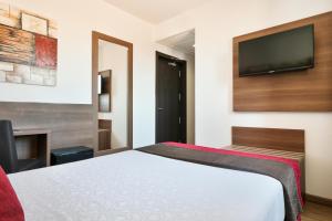 TV a/nebo společenská místnost v ubytování Hotel Best Auto Hogar